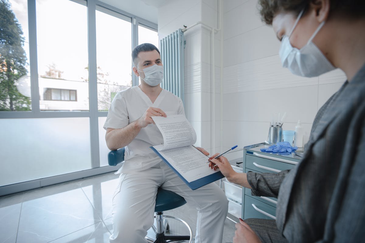 Pharmacist holding medication providing professional advice